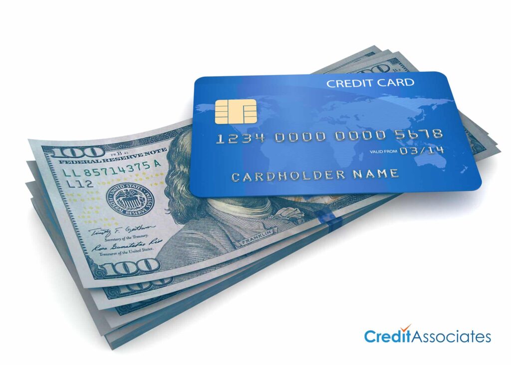 Cash underneath a credit card